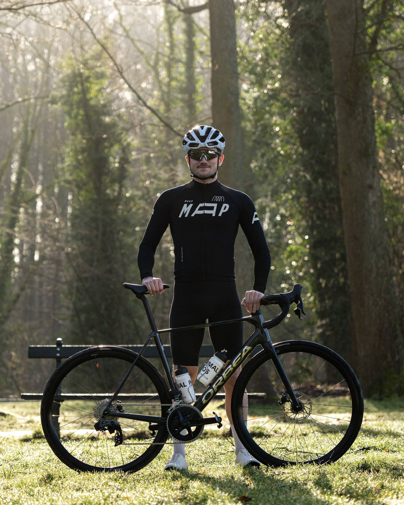 Pierre De Moor standing with his bicycle